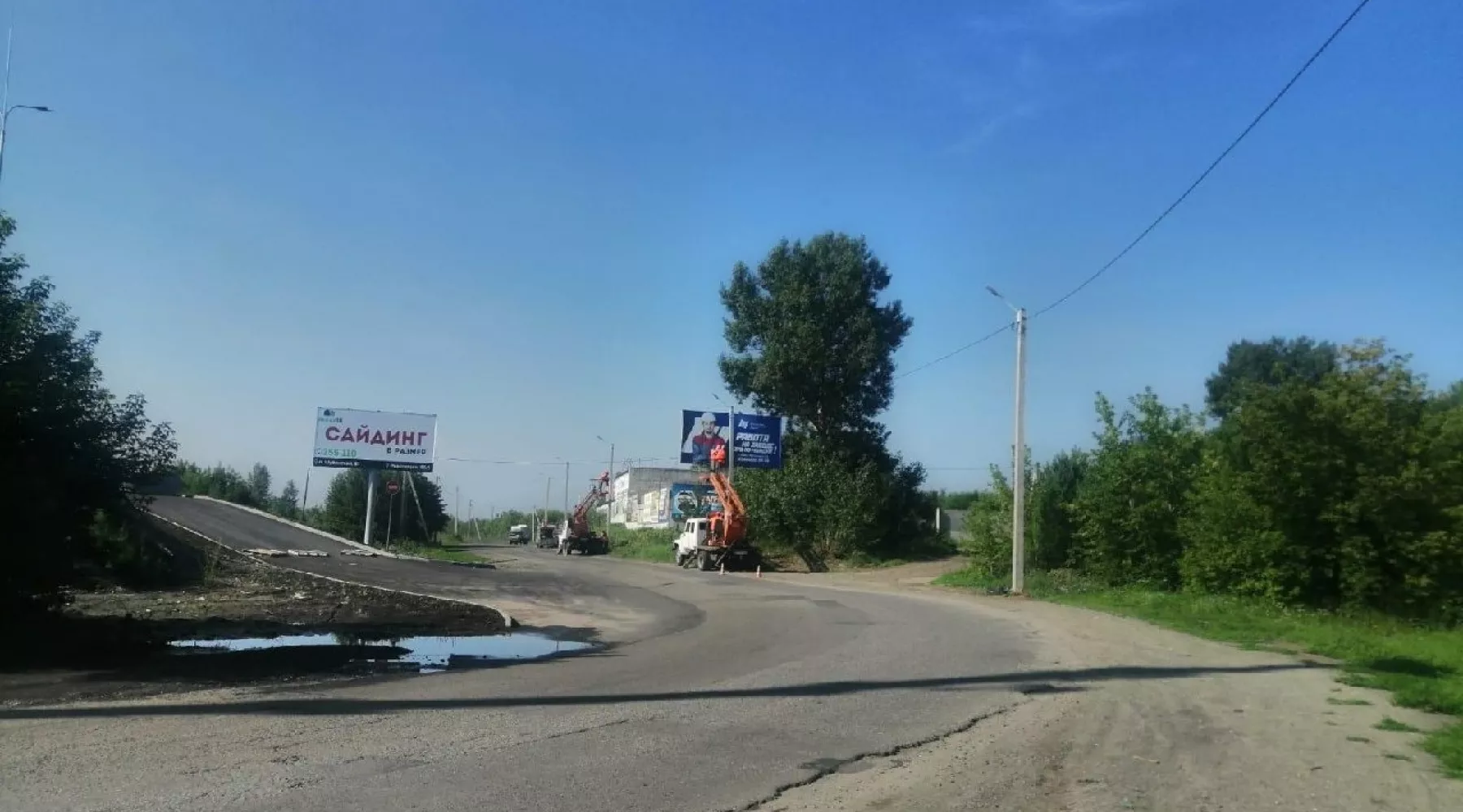 Монтаж уличного освещения к понтонному мосту